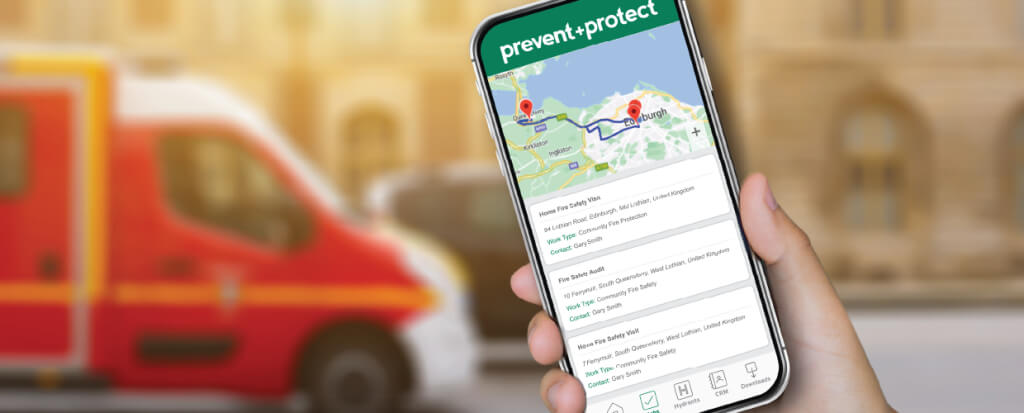 A phone displaying a P+P UI, with a firetruck blurred in the background